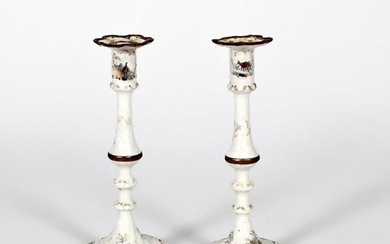 A small pair of Staffordshire enamel candlesticks c.1770,...