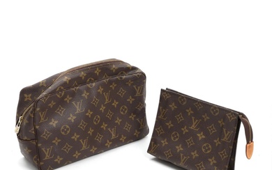 A toiletry pouch of monogram canvas with a golden zipper, one interior...