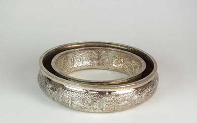 A white metal Middle Eastern flower ring bowl