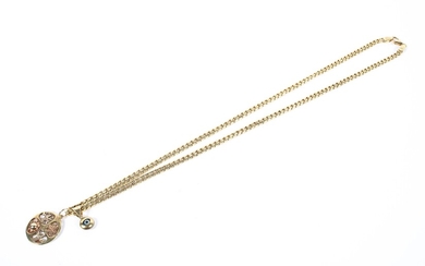 A yellow metal curb link necklace chain