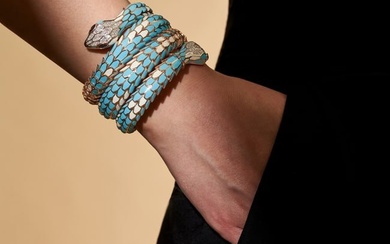 ALEXIS NY, A DIAMOND, SAPPHIRE AND TURQUOISE ENAMEL DOUBLED HEADED SNAKE BRACELET the snake compr...