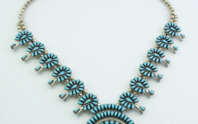 AMERICAN SOUTHWEST INDIAN SILVER AND TURQUOISE SQUASH BLOSSOM NECKLACE. In...
