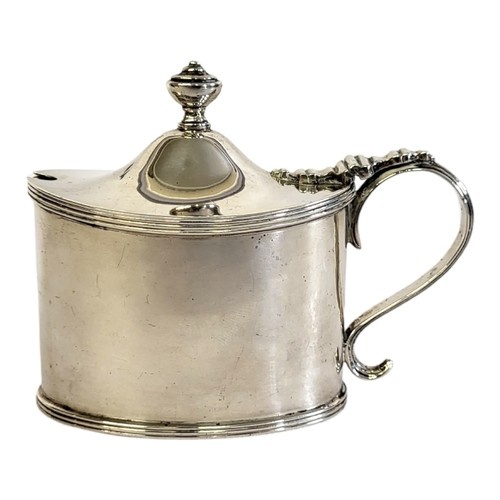 AN EARLY 20TH CENTURY SILVER MUSTARD POT An oval classical f...