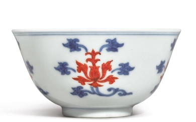 AN UNDERGLAZE-BLUE AND IRON-RED 'LOTUS' WINE CUP, YONGZHENG MARK AND PERIOD