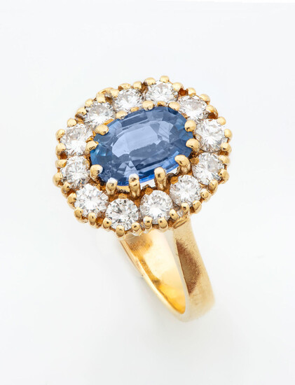 An 18K Gold Diamond and Sapphire Ring