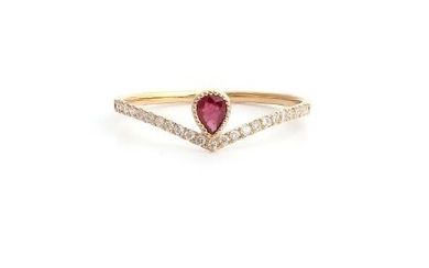 An 18ct yellow gold (stamped 750) ring set with a pear cut ruby and diamonds, (N.5).