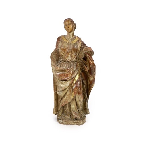 An 18th century Spanish carved wood figure of a female saint...