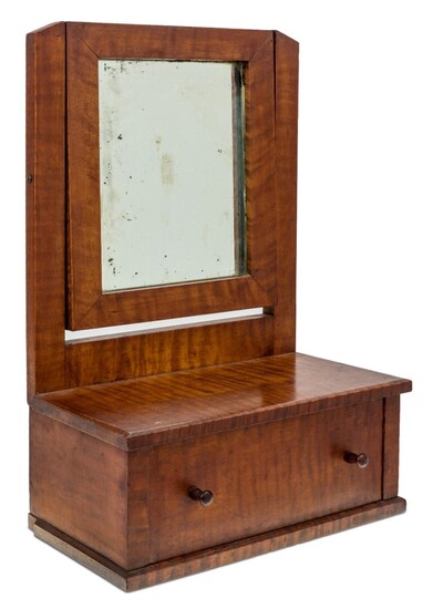 An American Shaker maple dressing table mirror, late 19th century, with single drawer, 46cm high, 30cm wide, 18cm deep Provenance: With William Smith, Vermont. The Geoffrey and Fay Elliot collection.