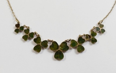 An Edwardian Connemara marble set shamrock necklace, the sev...