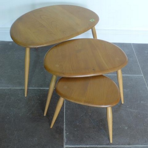 An Ercol Golden Dawn nest of three Pebble side tables - Heig...