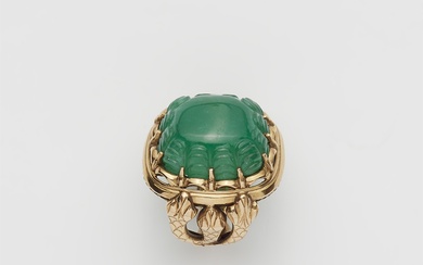An Italian 18k gold and large carved emerald snake ring.