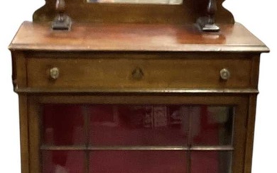 An early 20th century mahogany display cabinet with mirrored back,...
