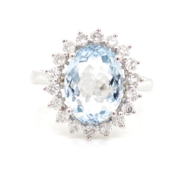 Aquamarine and diamond set cluster ring set 18ct white gold....