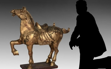 CARVED GILT TANG STYLE HORSE