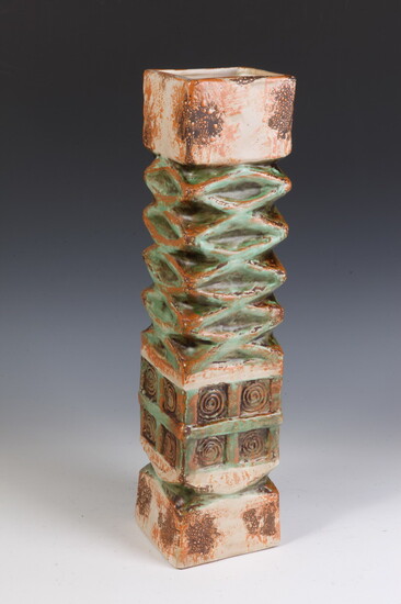 CONTEMPORARY STUDIO POTTERY SQUARE-SIDED PILLAR VASE WITH RELIEF DECORATION. Sea...