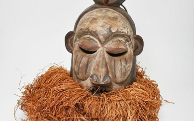Carved Wood and Painted African Mask.