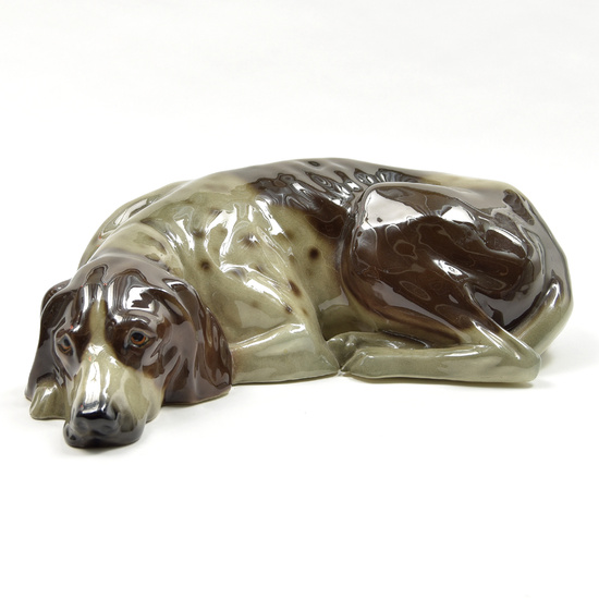 Ceramic sculpture of a resting dog (German pointer),...