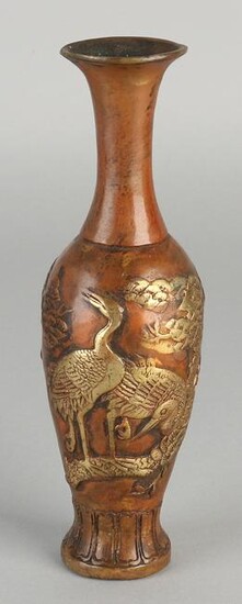 Chinese bronze vase with a crane decoration. With