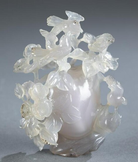Chinese lavender jade carving of birds and peach.