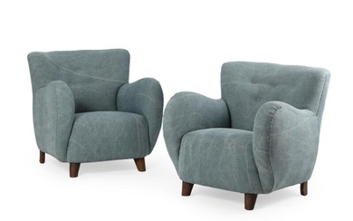 Danish furniture design A pair of easy chairs with curved armrests, upholstered...