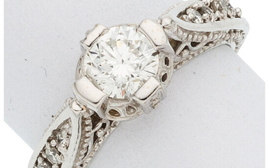 Diamond, White Gold Ring The ring features a round...