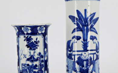 Due vasi cilindrici in porcellana bianca e blu decorati con paesaggi in giardino e motivi floreali Cina, secolo XVIII/XIX (h…