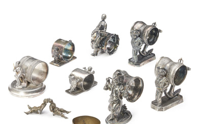 EIGHT FIGURAL SILVER-PLATED NAPKIN RINGS