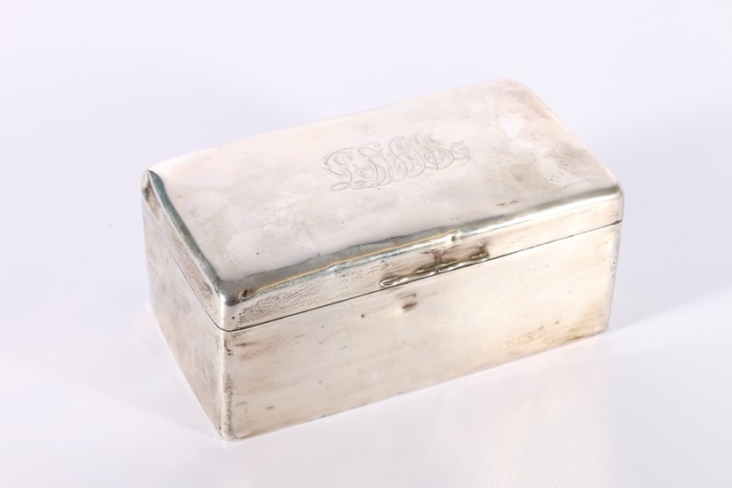Edward VII silver cigarette box of casket shape with engrave...