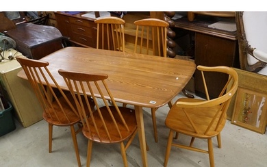 Ercol dining table together with with four Ercol style match...