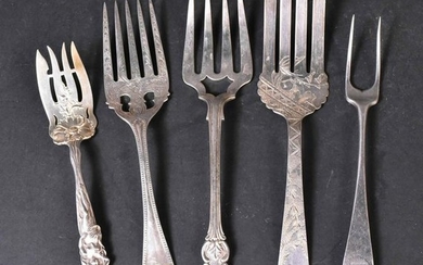 Five Silver Serving Forks