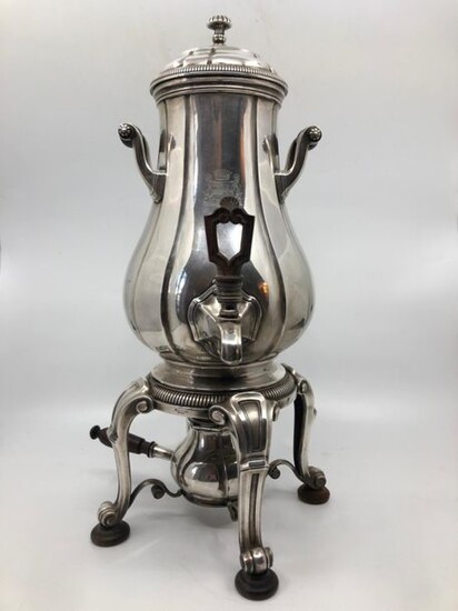 Silver plated metal hot water fountain in the form of...