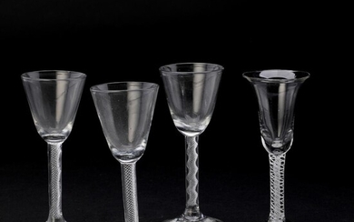 SOLD. Four English clear glasses, conical cups and one bell shaped on cylindrical stems with air twist, on round bases. 18th century. (4) – Bruun Rasmussen Auctioneers of Fine Art