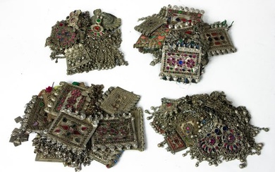 Four bags of Afghan necklaces
