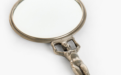 HAND MIRROR pewter, Schreuder & Ohlson, Stockholm, 1943. Grip in the form of nude female figure with closing grape cluster.