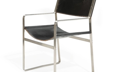 Hans J. Wegner: “JH 813”. Armchair with chromium-plated steel frame, seat and back with patinated black leather. Made by Johannes Hansen.