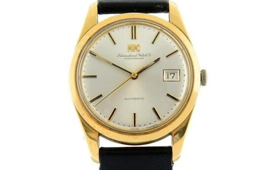 IWC - a wrist watch. Yellow metal case with engraved case back, stamped 18K 0,750 with poincon. Case