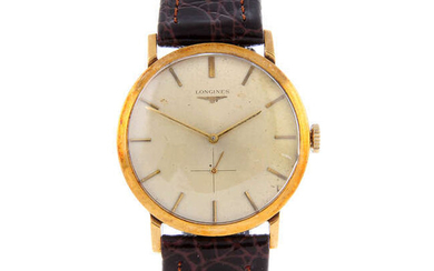 LONGINES - a gentleman's 9ct yellow gold wrist watch.