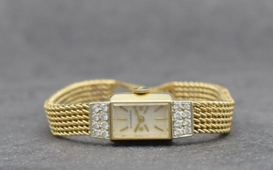 MOVADO diamonds set 14k yellow gold ladies wristwatch