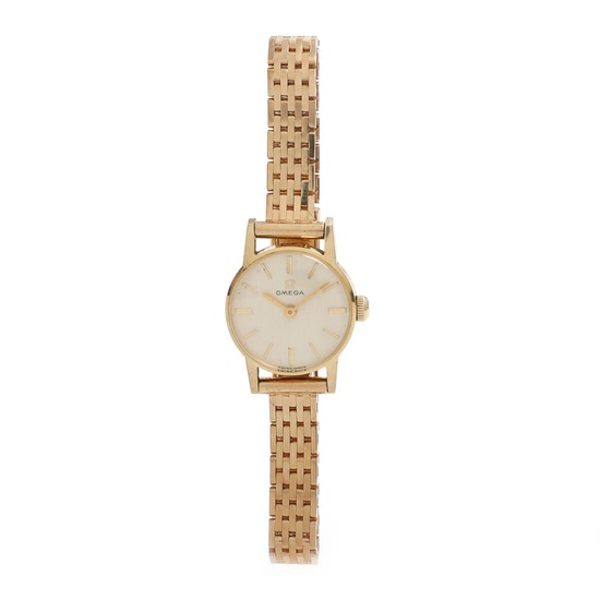 Omega A wristwatch of 14k gold. Mechanical movement with manual winding. Integrated...