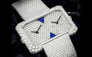 PATEK PHILIPPE. A VERY RARE 18K WHITE GOLD, DIAMOND AND LAPIS LAZULI-SET DUAL TIME BRACELET WATCH REF. 4404/3, MANUFACTURED IN 1976