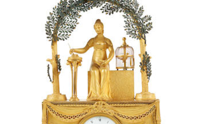 PENDULE D'EPOQUE EMPIRE EN BRONZE DORE ET BRONZE PATINE An early 19th century French ormolu and patinated bronze mantel clock