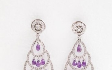 Pair of earrings in 18k white gold decorated...