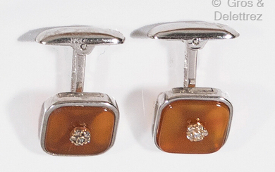 Pair of silver cufflinks, each adorned with six brilliant-cut diamonds...