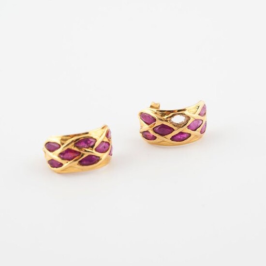 Pair of yellow gold (750) convex earrings paved with shuttle-cut...