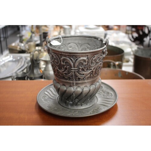 Pewter swing handled champagne bucket, with grotesque masks ...