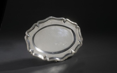 Silver oval dish with eight wrapped contours, the wing monogrammed....