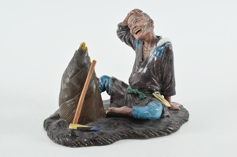 Pottery figure. Japan. Early 20th century. Polychromed