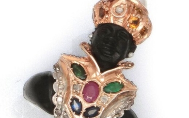 Tête de Maure" ring in 9K pink gold and silver enriched with sapphires, emeralds, rubies and diamonds. The body and the head figured in blackened wood. Finger size : 53. P. Rough: 10.5 g.