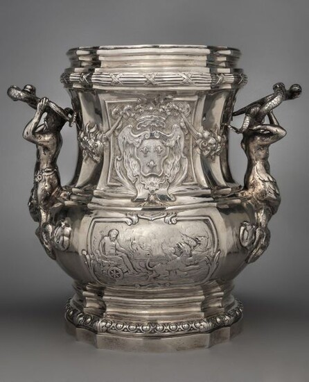 Silver refreshment bucket, decorated with marine scenes, adorned with coats of arms of France, the handles in mermaid and newt holding dolphins.