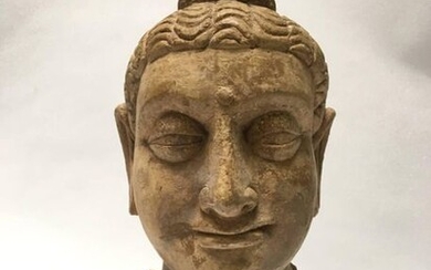 Stucco Buddha head.